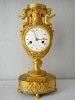 un exceptional cast and modelled Directoire urn-clock, ode to love and music, by Delecoeuillerie à Tournay, ca. 1795.
